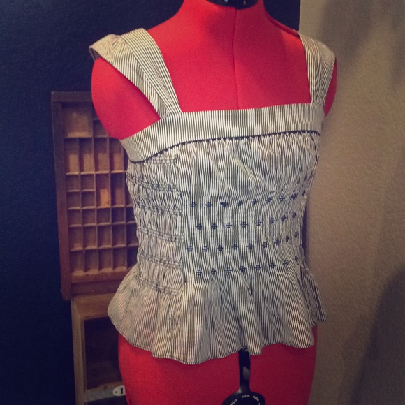 Black and white striped peplum top with bow. - Picture 1 of 3